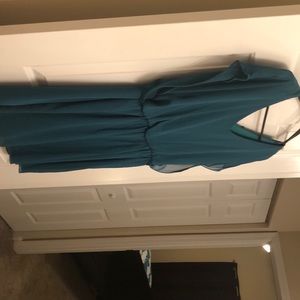 Knee length greenish blue dress